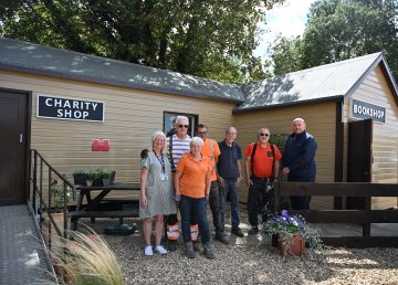 Nene Valley Railway volunteers with R G Carter at the charity shop in Wansford