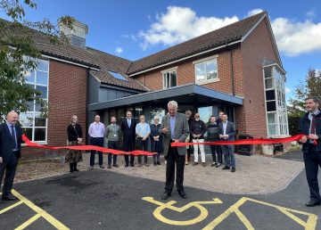 Project partners and representatives gather outside Bungay Medical Practice in Suffolk for a ribbon-cutting ceremony celebrating the completion of the £1.2 million extension and refurbishment project delivered by R G Carter Building Solutions.